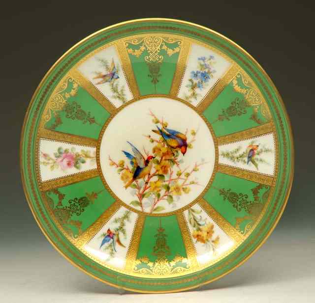 Appraisal: A ROYAL CROWN DERBY PLATE painted with two birds upon