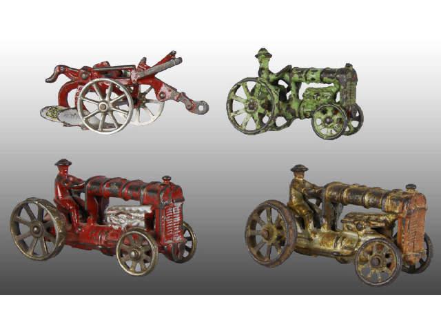 Appraisal: Lot of Toy Cast Iron Tractors Plow Description The tractors