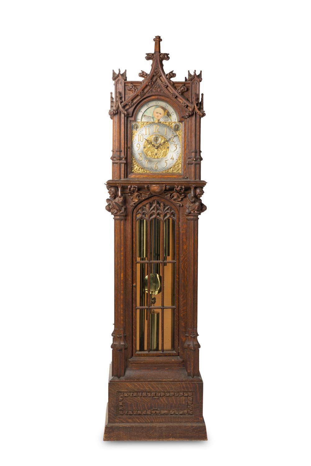 Appraisal: A GOTHIC-STYLE TALL CASE CLOCKA Gothic-style tall case clock th