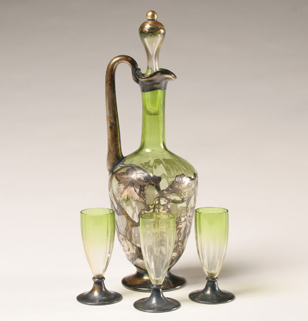 Appraisal: Nouveau green art glass liqueur set decanter with silver overlay