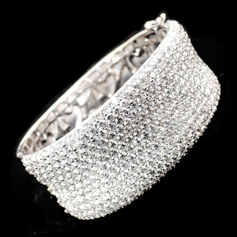 Appraisal: CT DIAMOND BANGLE KT GOLD BRACELET brilliant cut diamonds shared