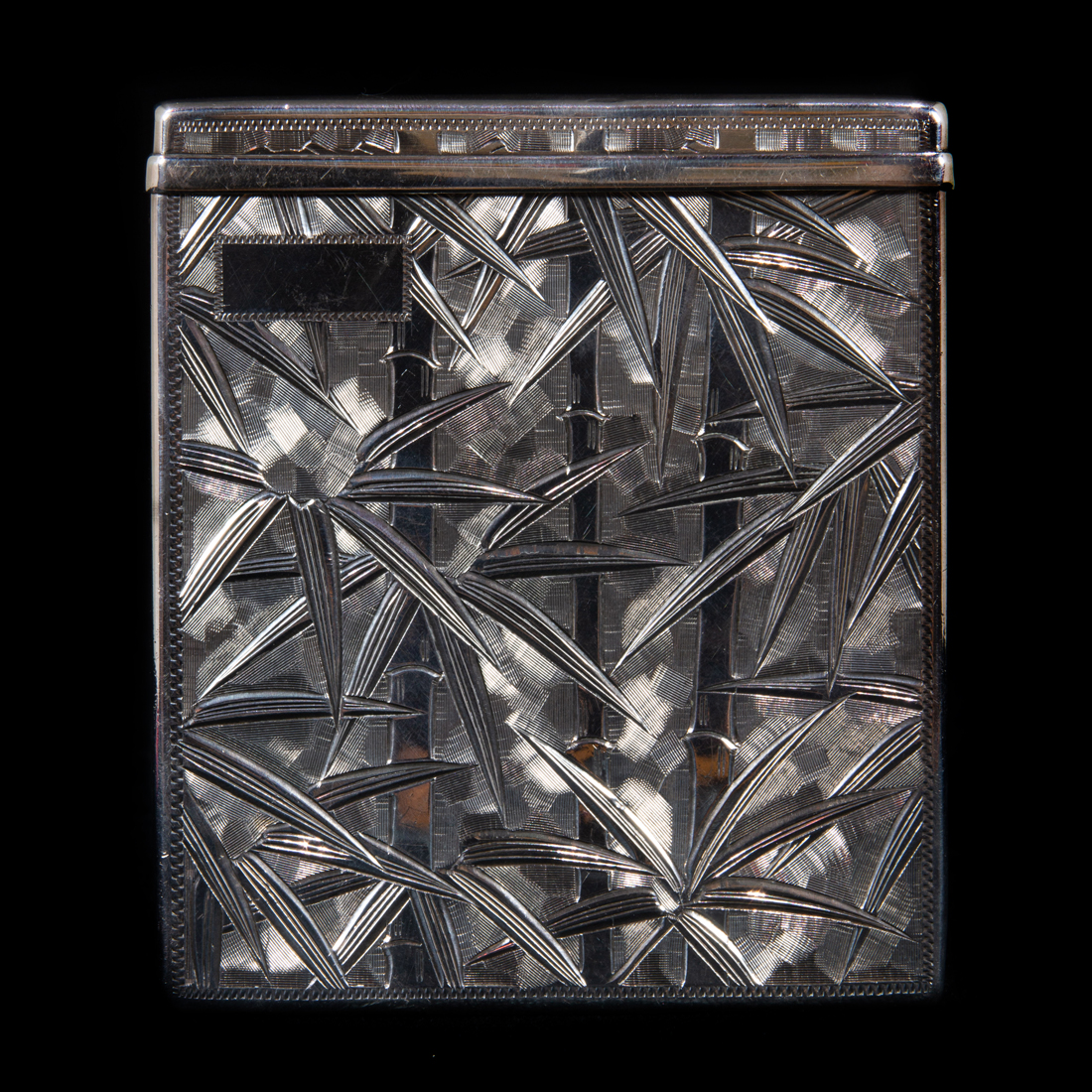 Appraisal: JAPANESE SILVER CIGARETTE BOX ENGRAVED WITH BAMBOO X Japanese silver