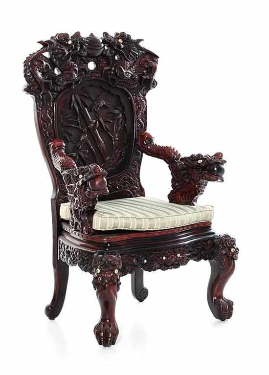 Appraisal: Impressive Chinese carved hardwood armchair late th century serpent crest