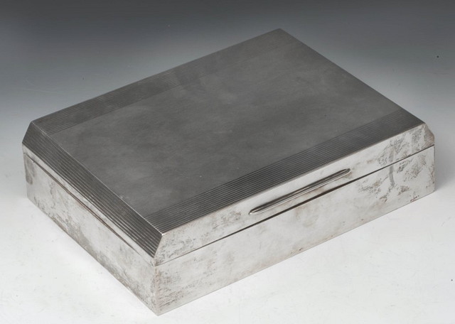 Appraisal: A SILVER CIGARETTE BOX of rectangular form with engine turned