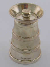 Appraisal: An Edwardian silver pepper mill shaped as a milk churn