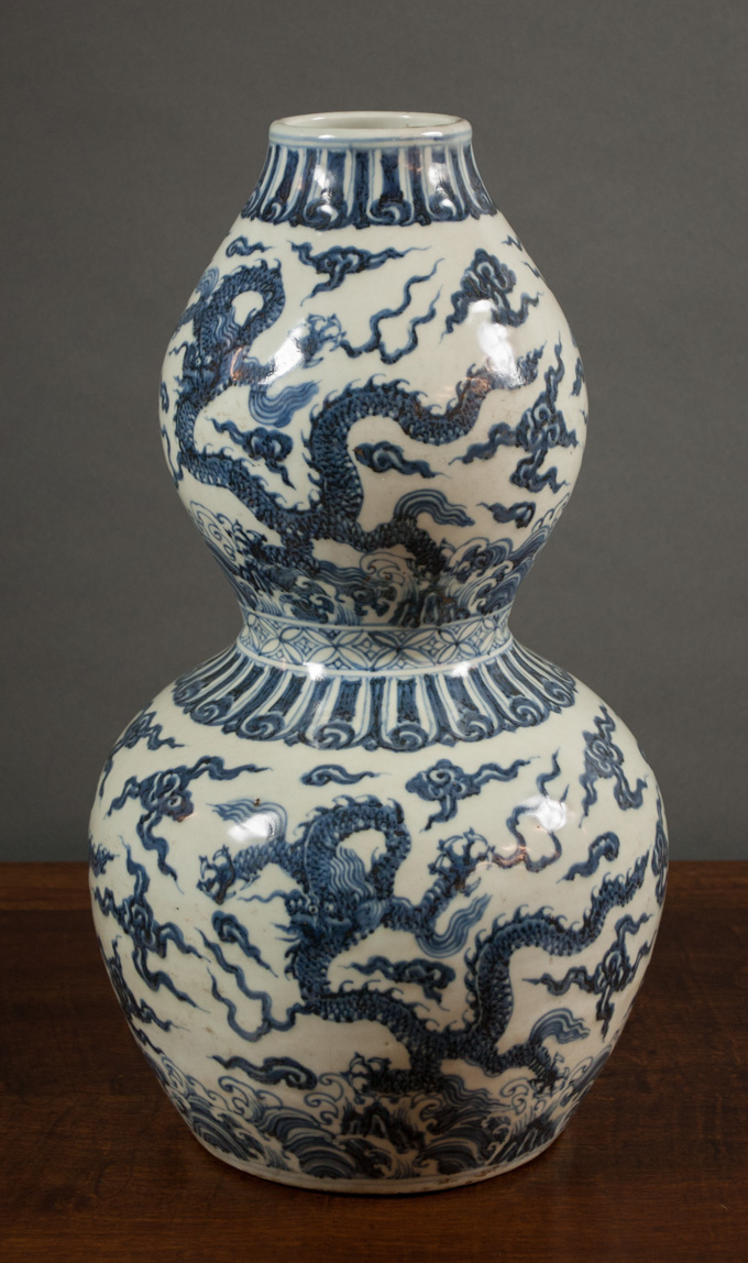 Appraisal: CHINESE QING BLUE AND WHITE PORCELAIN VASE double gourd form