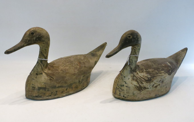 Appraisal: TWO METAL TIN DUCK DECOYS manufactured by the Anderson Decoy