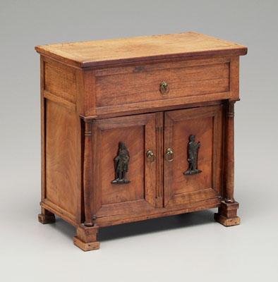 Appraisal: Biedermeier miniature chest turned columns lift-top above two paneled doors