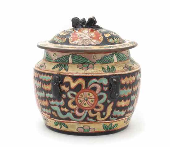 Appraisal: A Sino-Tibetan Polychrome Enamel Ceramic Lidded Urn the lid surmounted