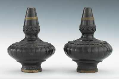 Appraisal: A Pair of Ceramic Temple Vases Brown ceramic pair of