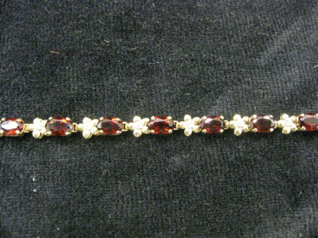 Appraisal: Garnet Diamond Bracelet oval gems with diamonds in between k