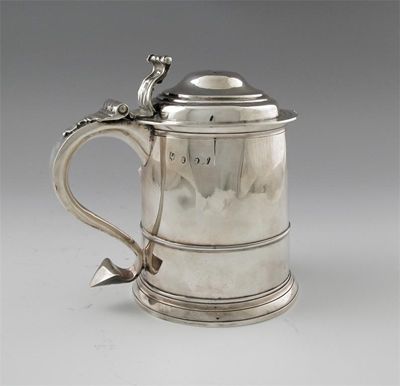 Appraisal: A Queen Anne tankard of tapering form with a skirted