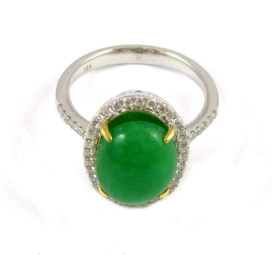 Appraisal: JADE DIAMOND AND FOURTEEN KARAT GOLD RING The white and