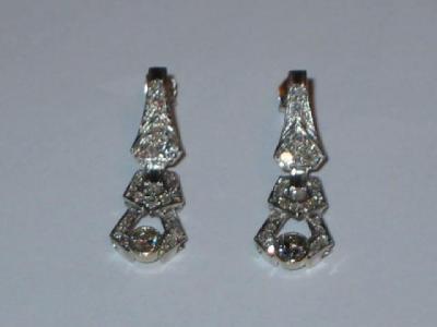 Appraisal: A PAIR OF ART DECO DIAMOND EARRINGS having a brilliant