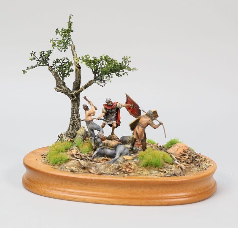 Appraisal: Battle scene diorama with hand painted metal toy soldier figurines