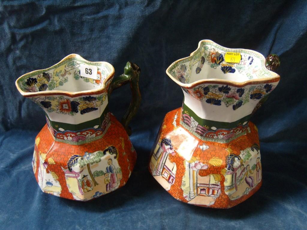 Appraisal: Two large th century graduated Masons Patent Ironstone jugs with