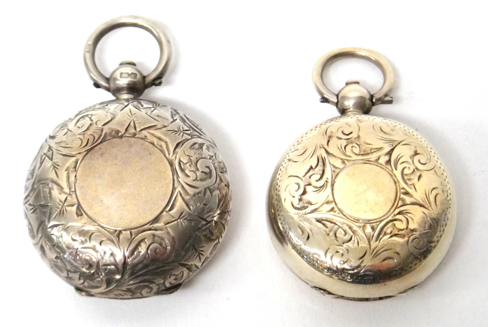 Appraisal: Two silver single compartment sovereign cases both having engraved decoration