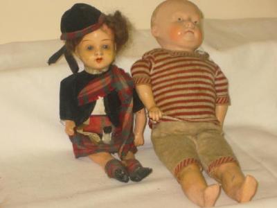 Appraisal: A composition shoulder head boy doll with painted face and