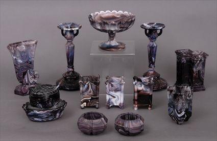 Appraisal: TWELVE PURPLE SLAG GLASS ARTICLES Including a pair of candlesticks