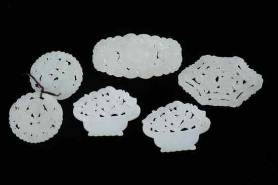 Appraisal: SIX CHINESE WHITE JADE PENDANTS Two flower-filled baskets floral decoration