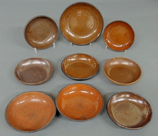 Appraisal: Nine th c Pennsylvania redware pie plates largest dia