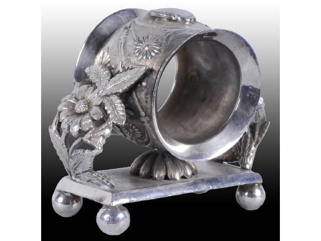 Appraisal: Lot of Figural Flower Napkin Rings Description Flowers and leaves