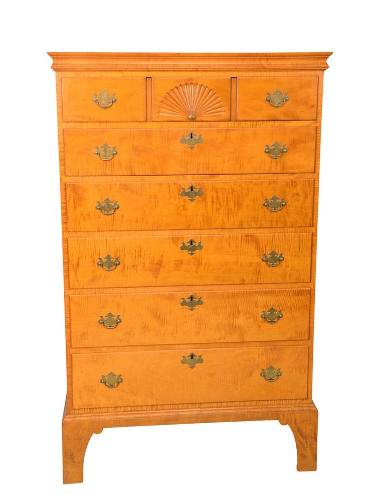 Appraisal: Jeffery Green Tiger Maple Six Drawer Tall Cheston bracket baseheight