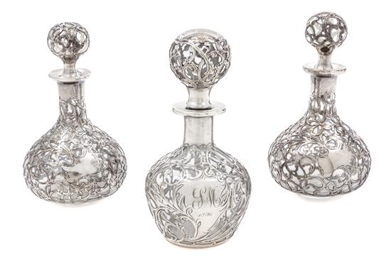 Appraisal: Sale Lot A Group of Three Silver Overlay Glass Bottles