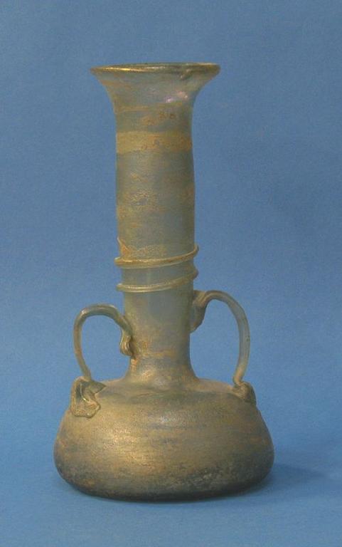 Appraisal: A ROMAN GLASS VASE of clear pale blue colour with