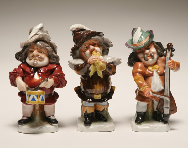 Appraisal: Three Capo di Monte dwarf musicians polychromed hirsute minstrels in