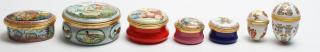 Appraisal: Halcyon Days Enamel Boxes Comprising two egg-shaped boxes teddy bear