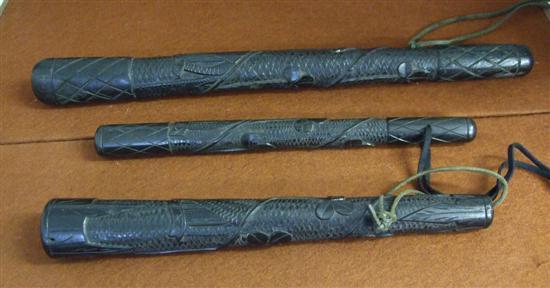 Appraisal: Three Irish bog oak truncheons carved with clover and harps