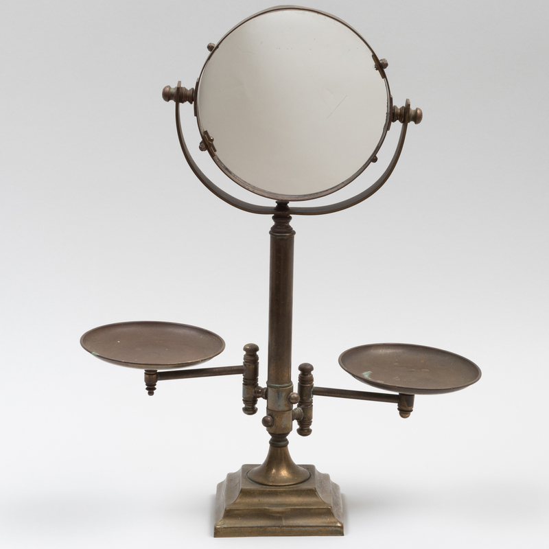 Appraisal: Edwardian Brass Plated Shaving Mirror With two dishes on swing