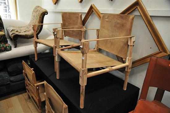 Appraisal: A PAIR OF LEATHER SAFARI STYLE CHAIRS