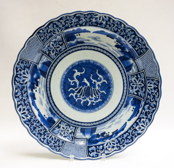 Appraisal: CHINESE EXPORT PORCELAIN CHARGER with blue underglaze decoration and reverse