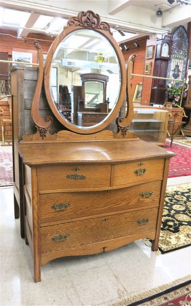 Appraisal: LATE VICTORIAN OAK DRESSER WITH MIRROR American c featuring a