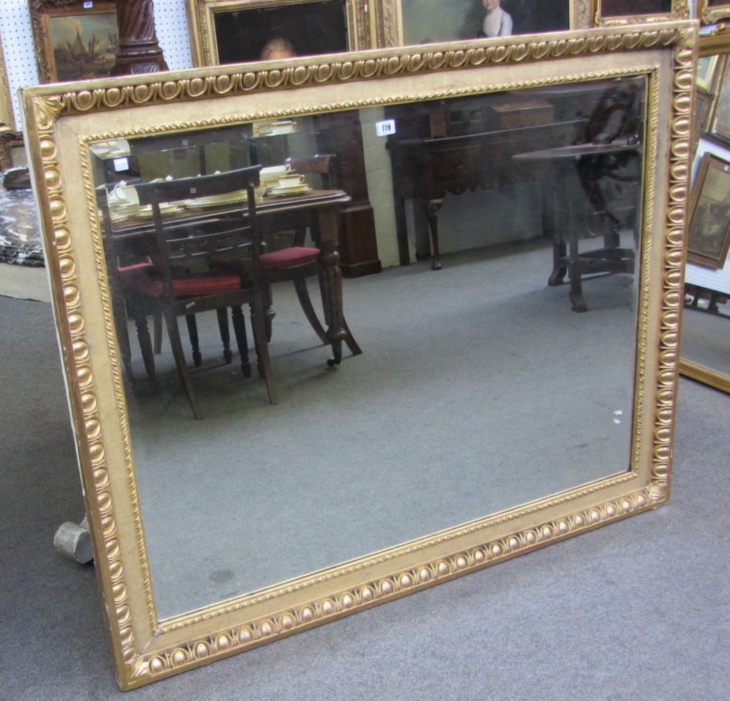 Appraisal: A th century rectangular gilt framed overmantel mirror with egg