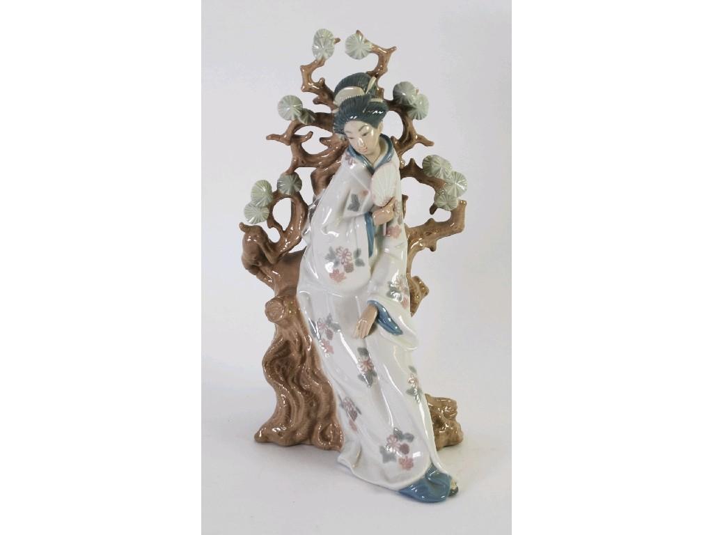 Appraisal: LLADRO PORCELAIN FIGURE OF AN ORIENTAL FEMALE modelled in floral