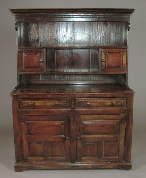 Appraisal: A George I Welsh oak dresser the cornice over two