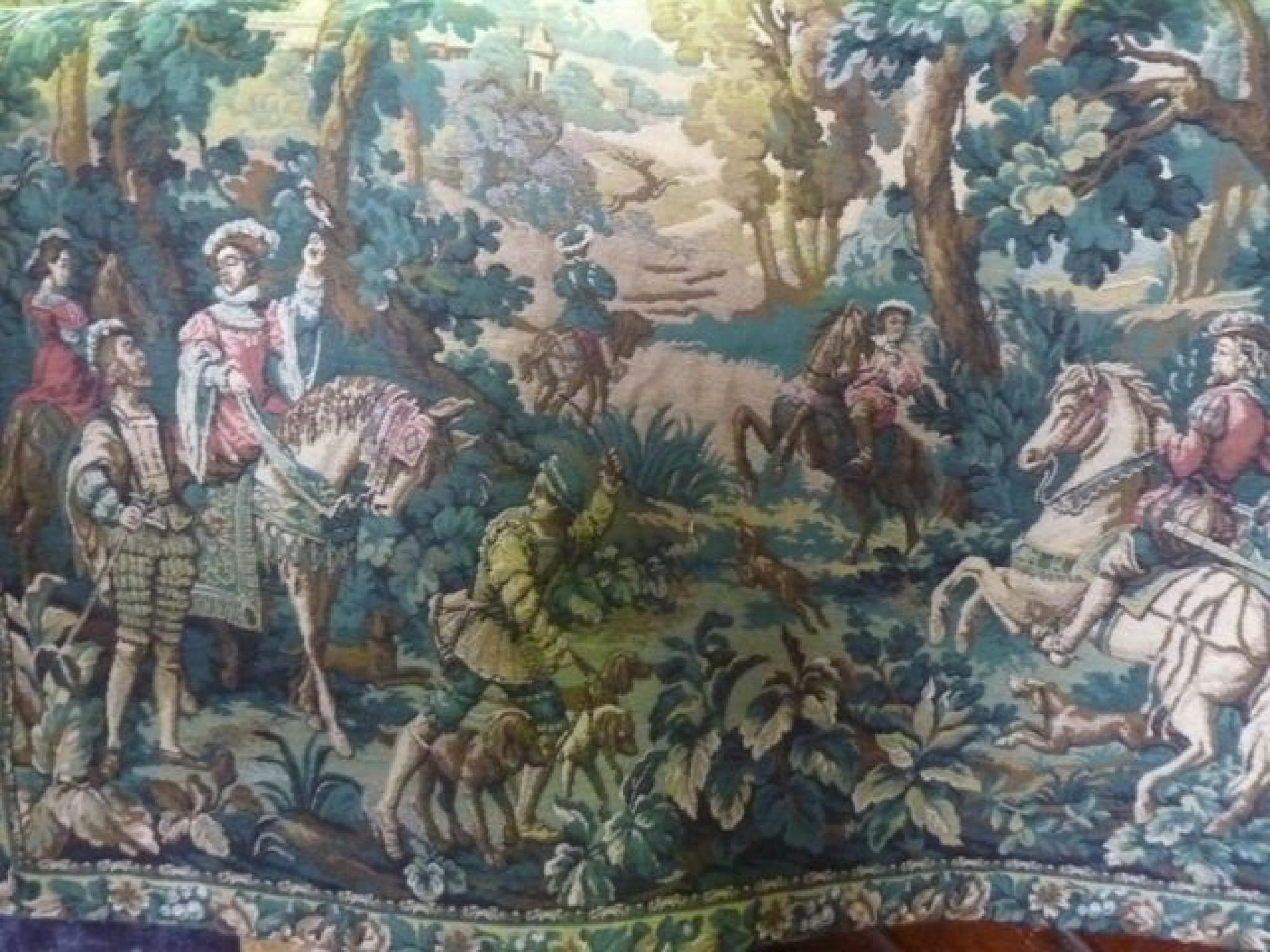 Appraisal: A continental machine made wool tapestry showing medieval hunting scene