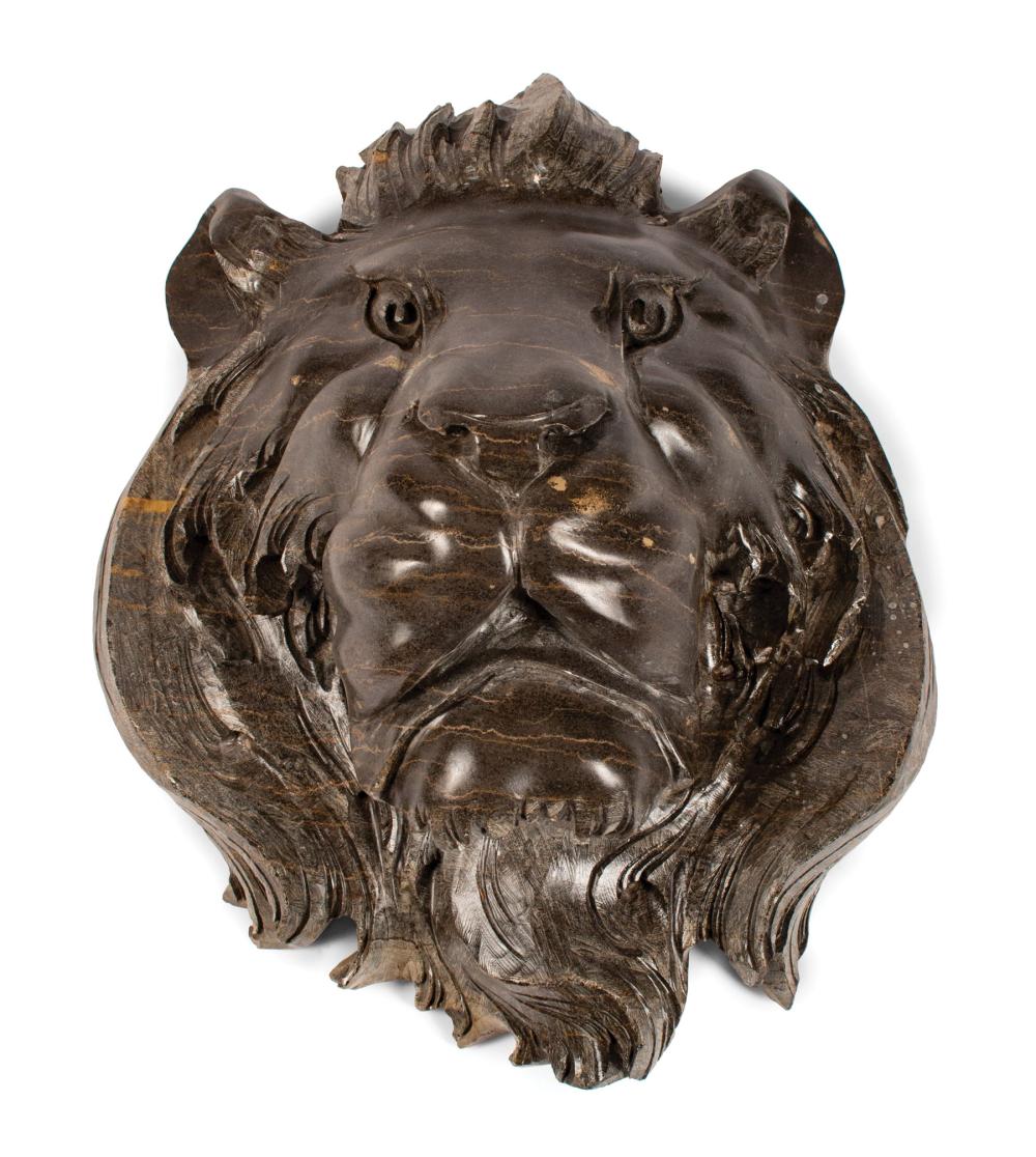 Appraisal: Carved Variegated Black Marble Lion's Head h in w in