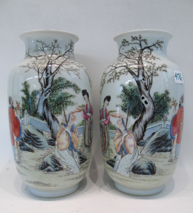 Appraisal: PAIR OF CHINESE QING DYNASTY PORCELAIN VASES depicting courtly figures