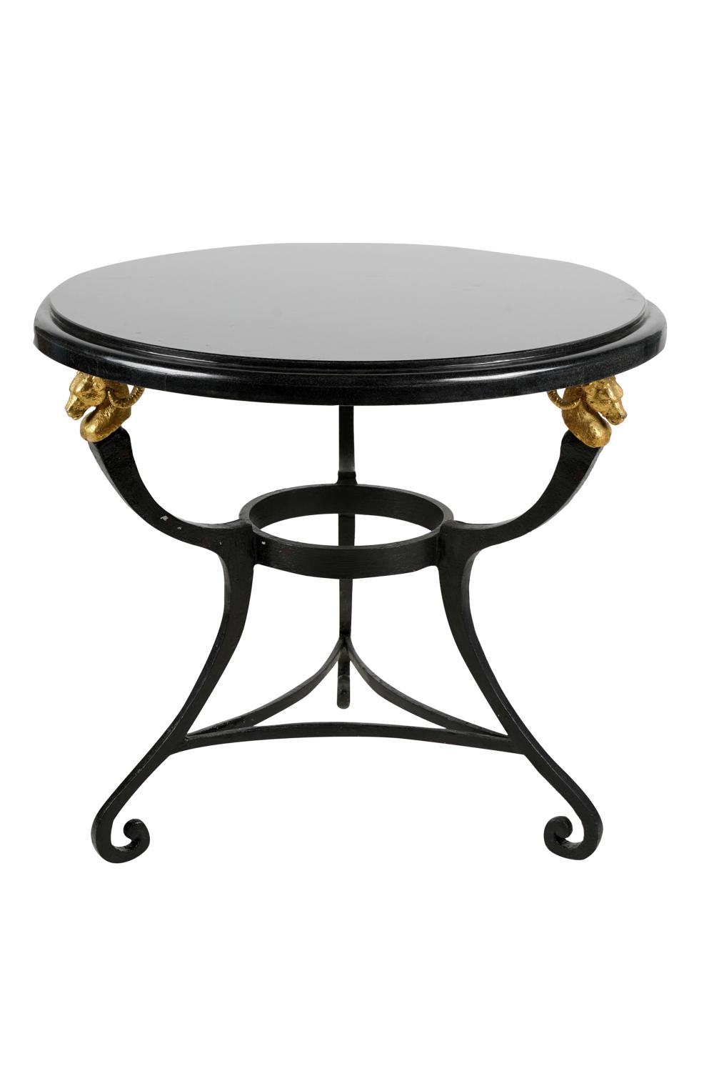 Appraisal: IRON RAMS HEAD TABLEblack granite top resting on a parcel