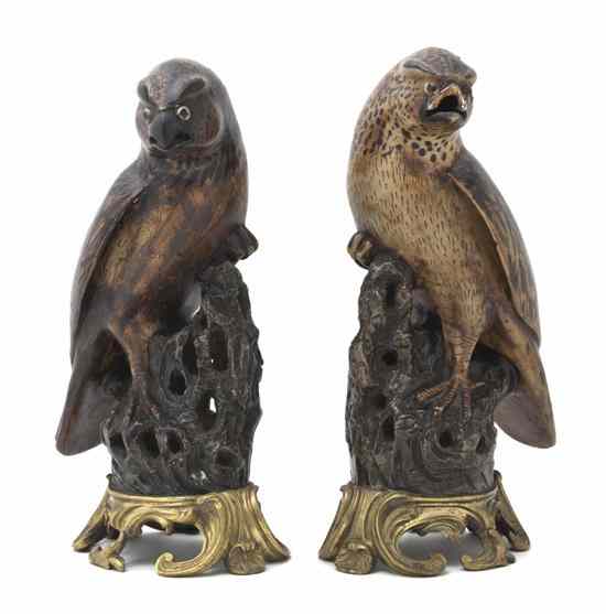 Appraisal: A Pair of Chinese Gilt Metal Mounted Stoneware Models of