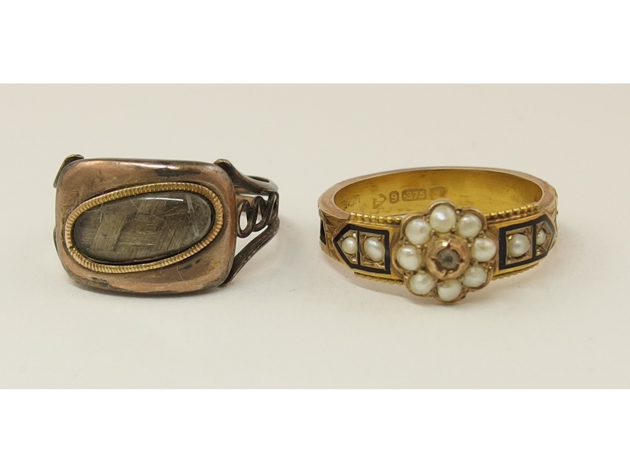 Appraisal: A ct pearl and diamond mourning ring together with another