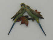 Appraisal: A cold painted bronze wall plaque group of two budgerigars