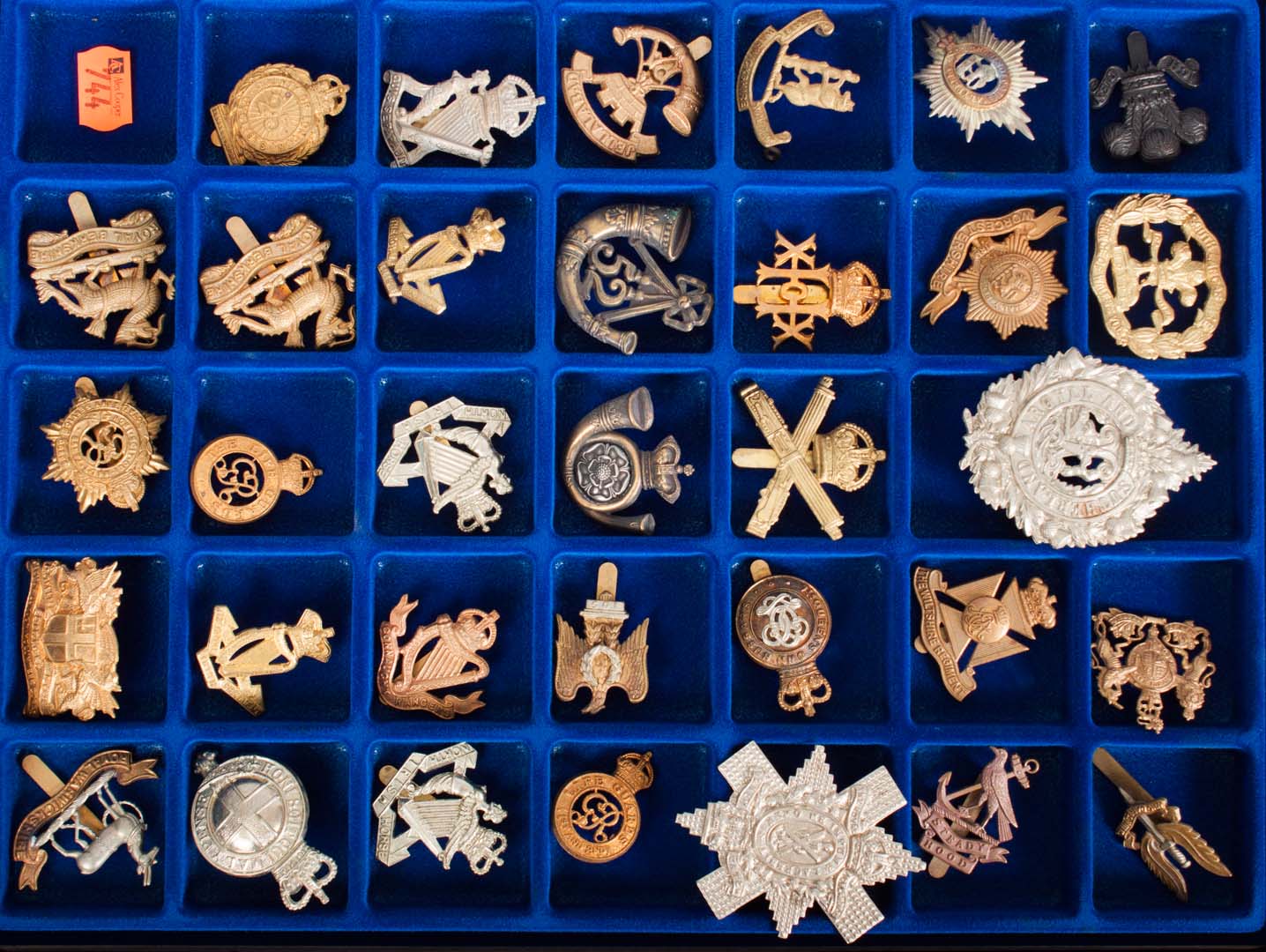 Appraisal: Thirty-three British military insignia late th and th century representing