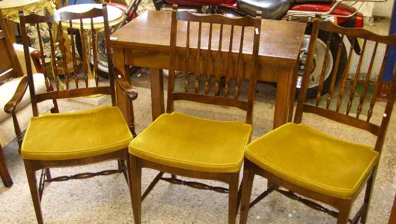 Appraisal: Twist Top Dark Wood Table and Three Chairs