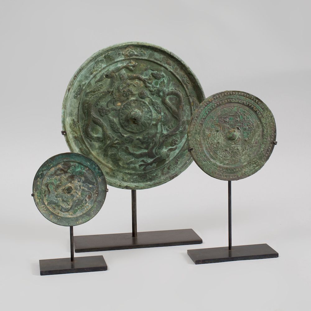 Appraisal: Three Chinese Archaistic Bronze Mirrors The largest with two dragons