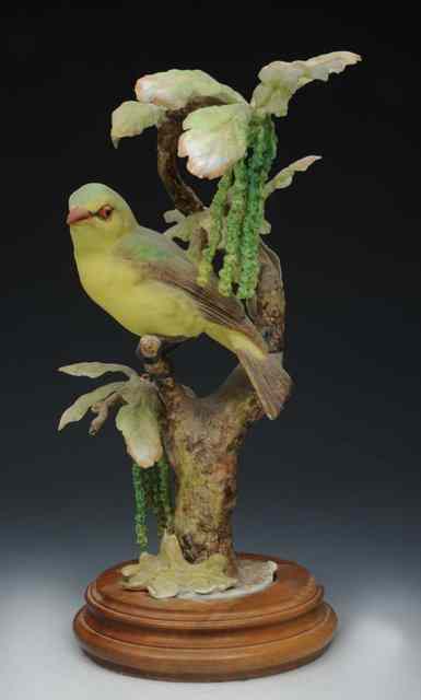 Appraisal: A ROYAL WORCESTER MODEL 'Scarlet Tanager' modelled by Dorothy Doughty